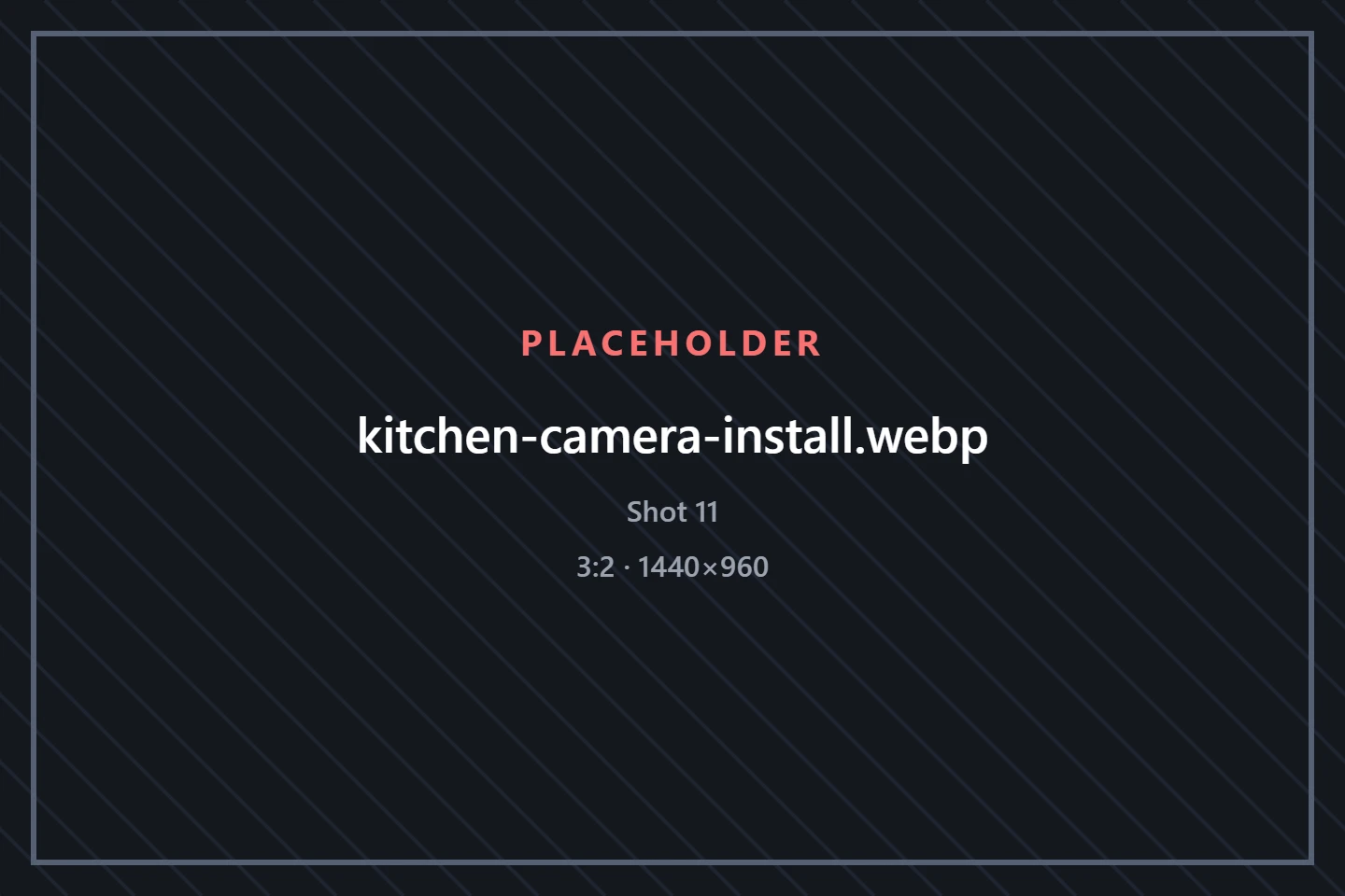 A technician mounts a small camera above the food-preparation area of a restaurant kitchen.